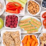 62914016 – healthy snacks on wooden table, top view